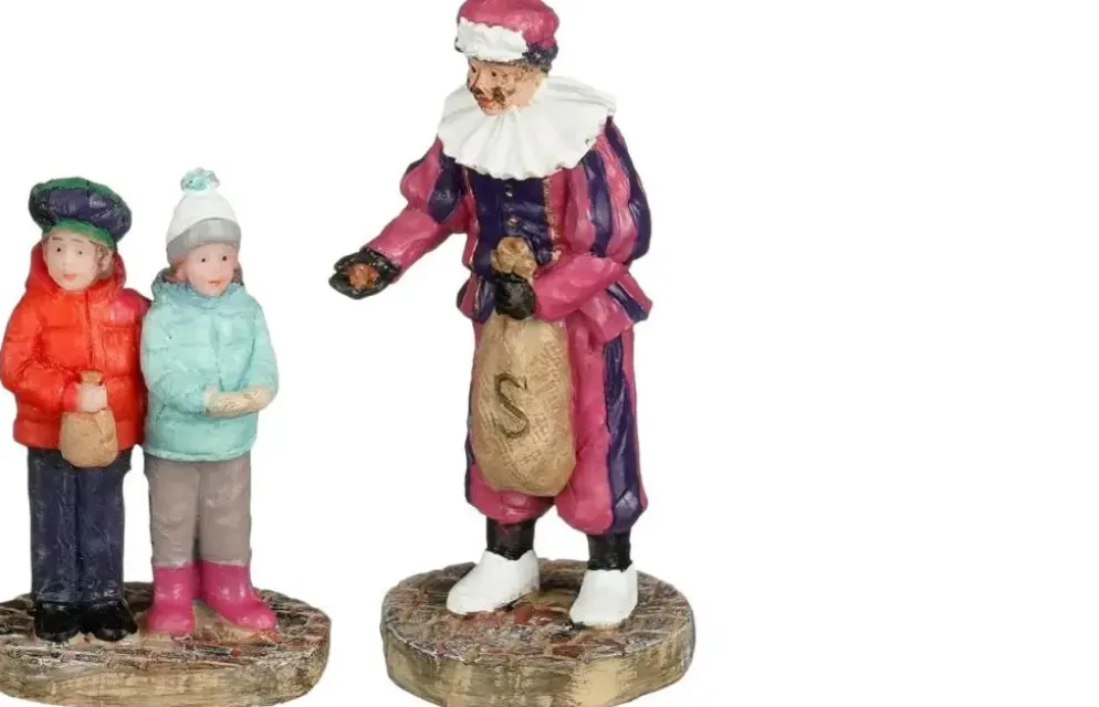 Luville Molendam Piet geeft pepernoten